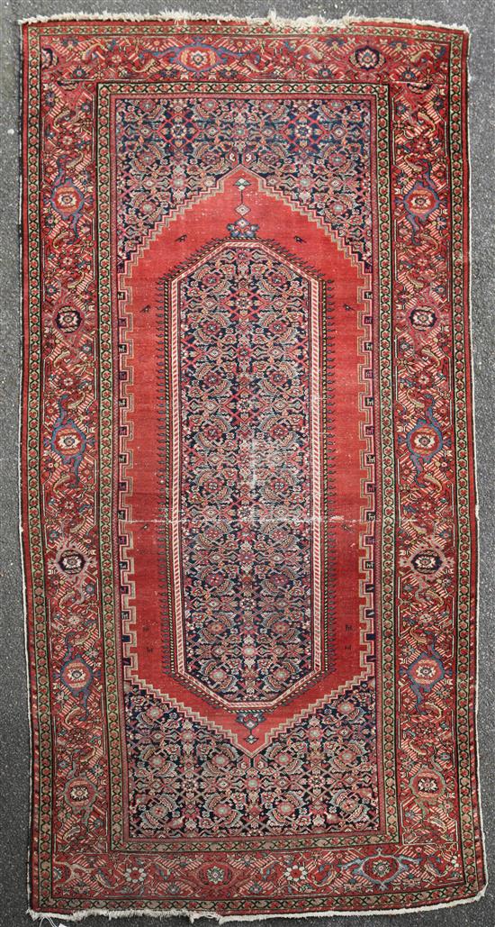 A Caucasian rug, 10ft 2in by 5ft 2in.